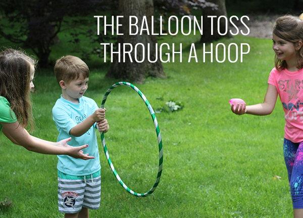 Balloon Through Hoop Water Balloon Game