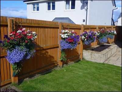 14 Super Unique and Easy to Make Fence Planters