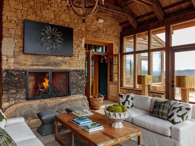 An example of a rustic , enclosed patio with seating area _ Market Hill Round Top