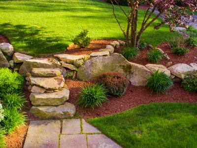 Well landscaped rock stairs and rock wall