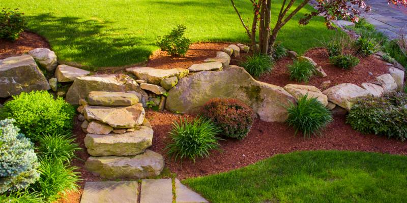 Well landscaped rock stairs and rock wall