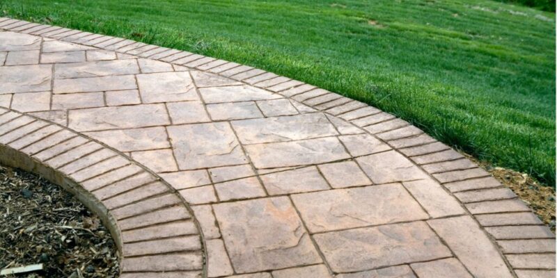 How to Install Pavers Over a Concrete Patio and Driveway