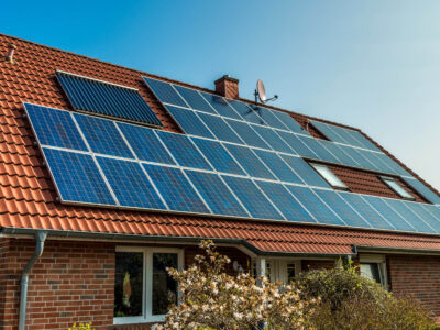 Solar panel on a red roof