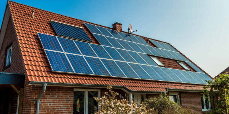 Solar panel on a red roof