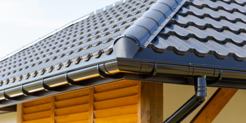 Metal gutter on house with Leaf Filter handle, designed to handle heavy rain