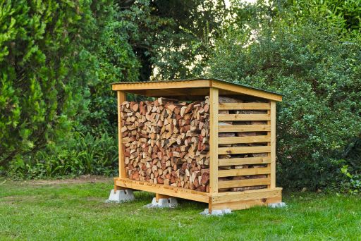 A wooden storage box in the garden