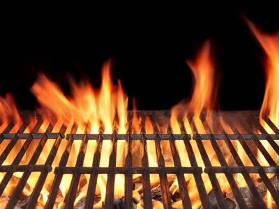 Barbecue Fire Grill close-up, isolated on Black Background